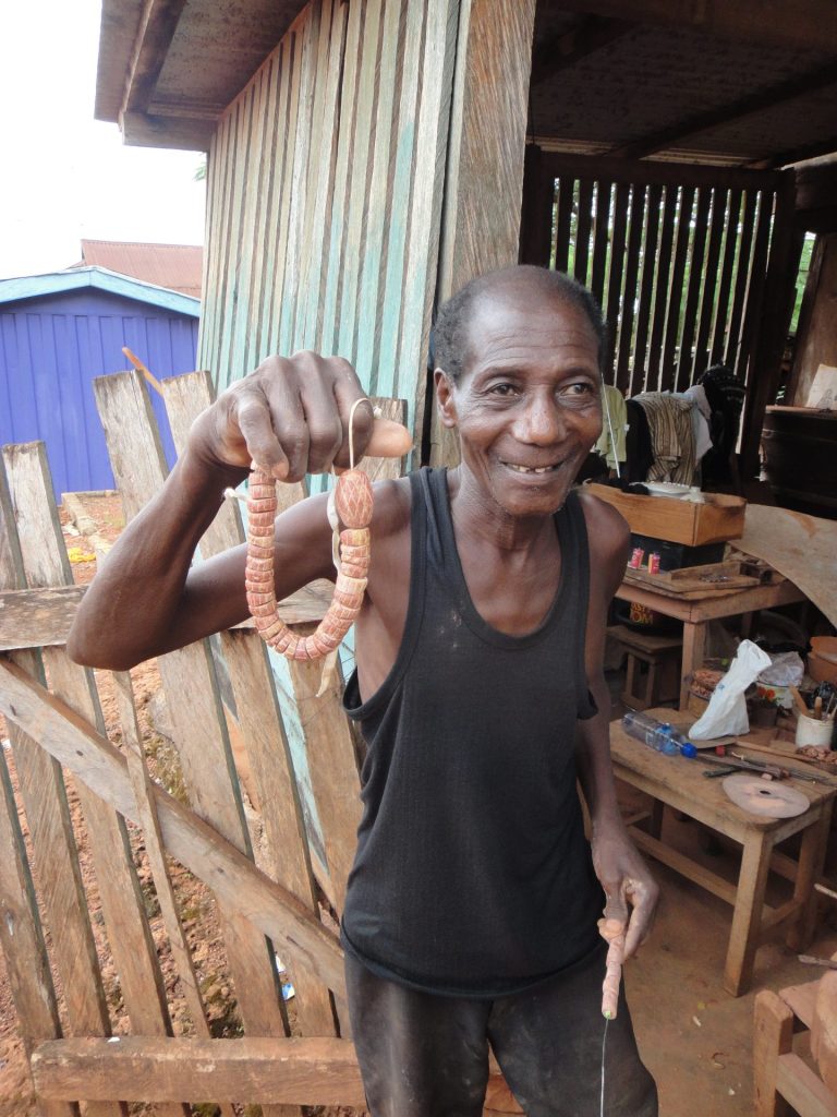 Showing off his Bauxite Beads